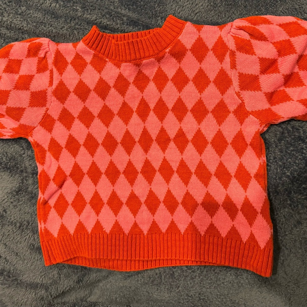 Super cute puff sleeve sweater.